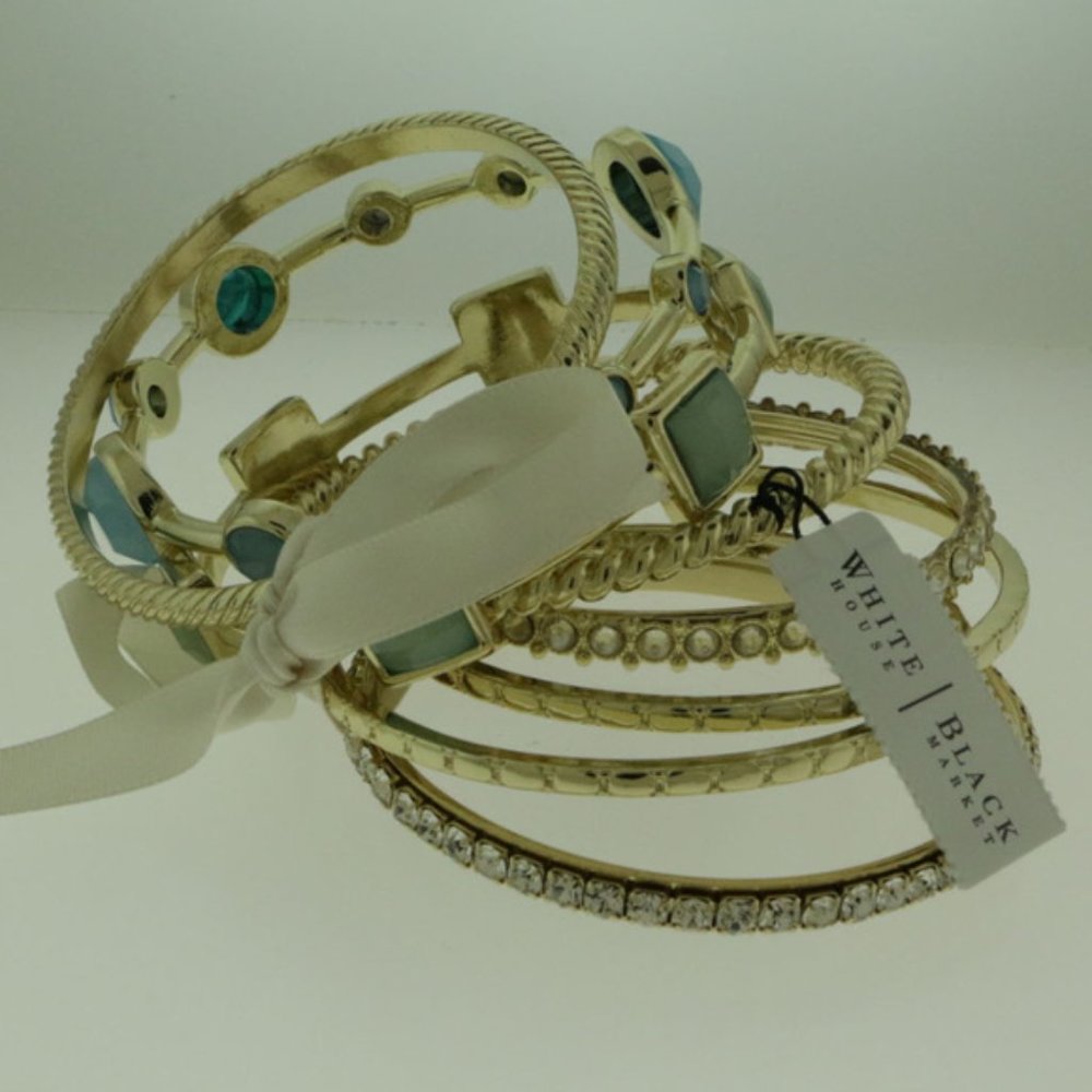 WHBM set of 7 gold & blue stone/crystal bracelet